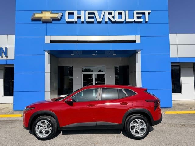 2026 Chevrolet Trax LS in Apex Red — front three-quarter view